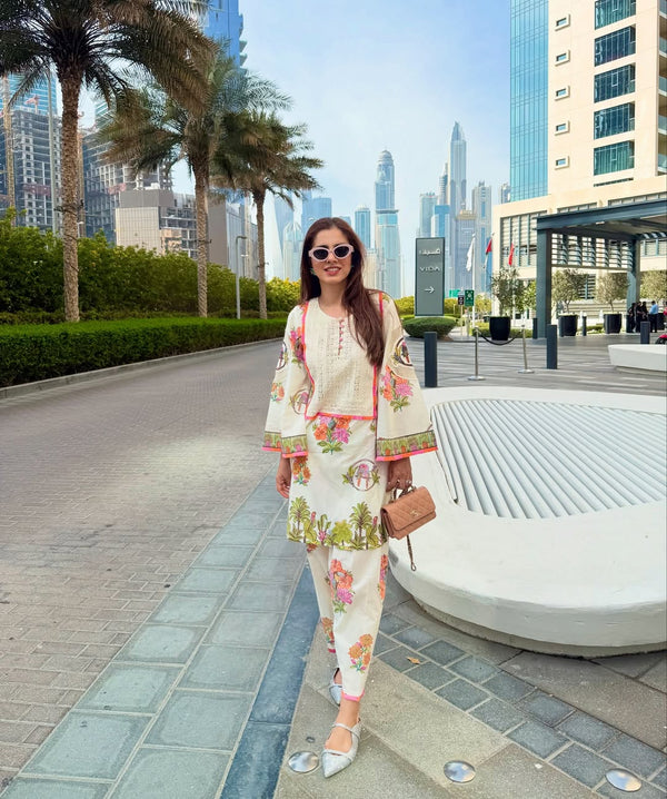 OFF WHITE TROPICAL BLOOM SHORT KURTA WITH TULIP SALWAR SET - SET OF 2