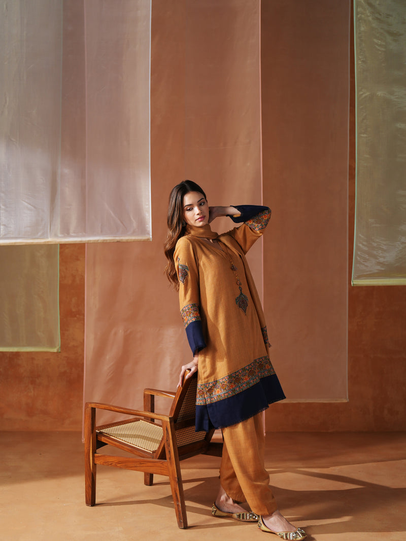 MUSTARD AND NAVY BLUE PASHMINA SHORT KURTA WITH SALWAR AND STOLE