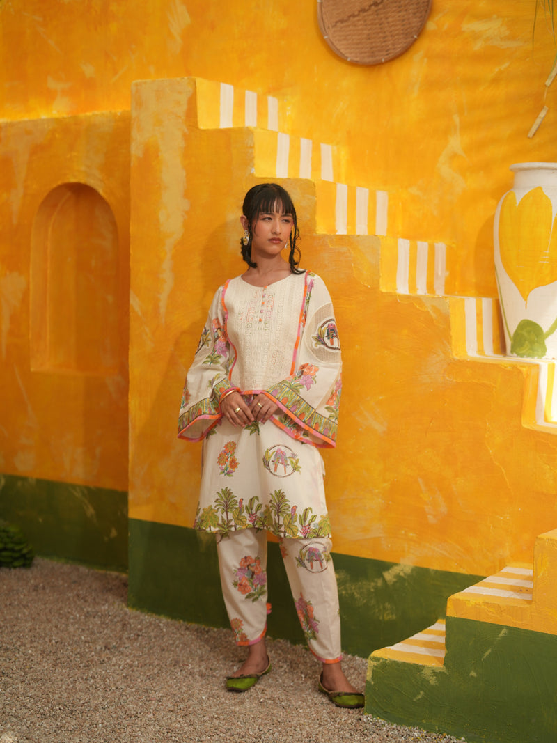 OFF WHITE TROPICAL BLOOM SHORT KURTA WITH TULIP SALWAR SET - SET OF 2