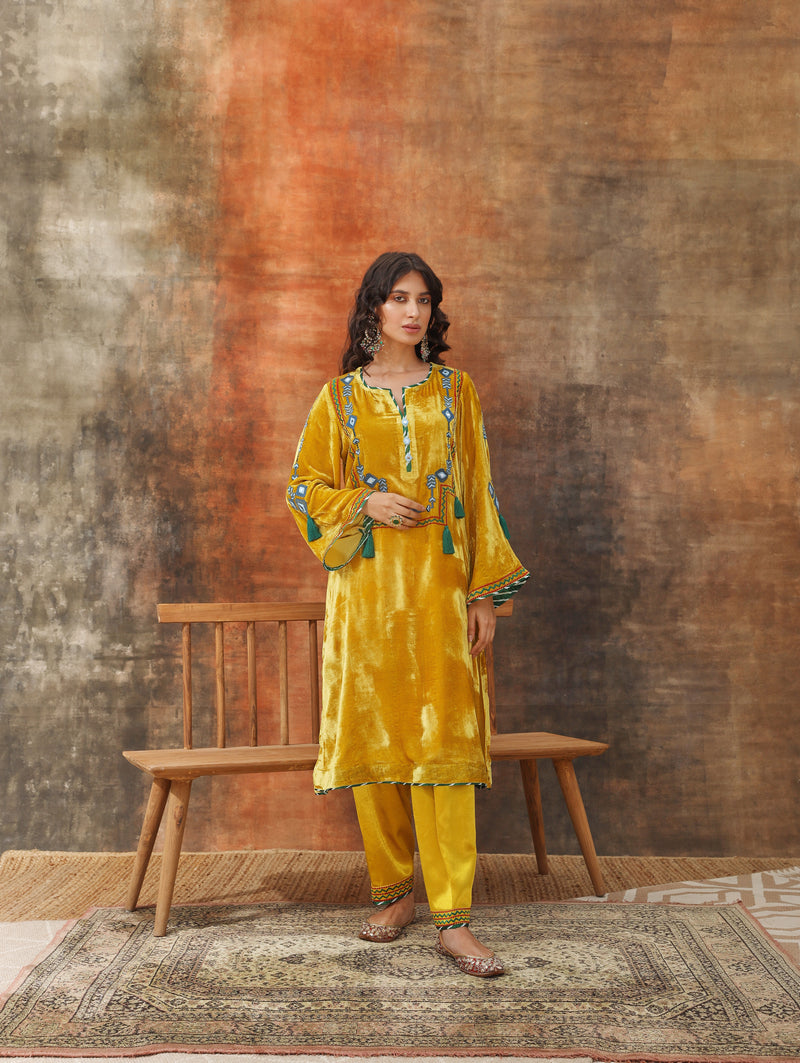 Yellow straight silk velvet kurta with salwar